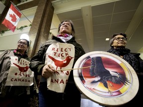 Members of Beaver Hills Warriors and Extinction Rebellion Edmonton protest further expansion of the oilsands, specifically the Teck Frontier Mine, inside Canada Place, in Edmonton Wednesday Jan. 22, 2020. Photo by David Bloom