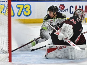Edmonton Oil Kings Dylan Guenther skates to the net against Moose Jaw Warriors goalie Adam Evanoff at Rogers Place in Edmonton on Jan. 3, 2020.