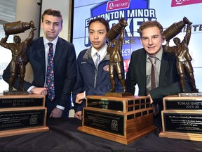 The 2020 Wayne Gretzky Award winners posing with their hardware, from left, Ryan Stephenson, Max Lee and Thomas Gmitter at the kick-off for the Quikcard Edmonton Minor Hockey Week 2020 at Rogers Place, starting January 10th in Edmonton, January 8, 2020.