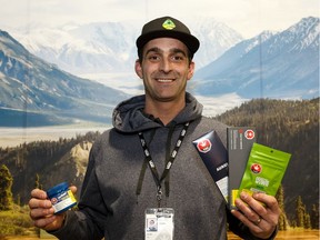 Curtis Martel, president of Mountain Standard Cannabis, with the first shipment of cannabis edibles at the 9729 118 Ave. store in Edmonton on Monday, Jan. 13, 2020.