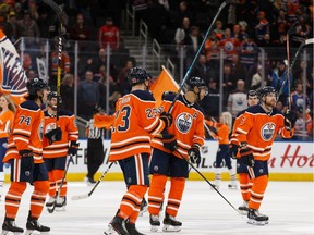 The Edmonton Oilers celebrate their 4-2 win over the Nashville Predators during a NHL hockey game at Rogers Place in Edmonton, on Tuesday, Jan. 14, 2020.