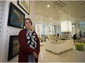 Karen Bishop, an Edmonton member of the Alberta Arts Matter Coalition poses for a picture before attending the meeting of the Special Standing Committee on Members Services to oppose the closure of Alberta Branded.