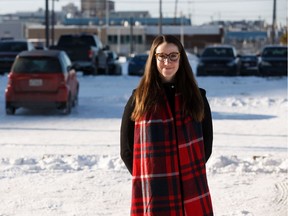 Urban planner and YEGarden Suites president Ashley Salvador poses for a photo in an under-utilized Impark parking lot north of Rogers Place in Edmonton, on Tuesday, Jan. 21, 2020. Photo by Ian Kucerak/Postmedia