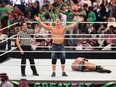 John Cena celebrates defeating Triple H during the World Wrestling Entertainment (WWE) Greatest Royal Rumble event in the Saudi coastal city of Jeddah on April 27, 2018.