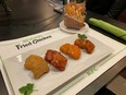 A plate of Beyond Fried Chicken served with KFC sauces is seen in Chicago, on Tuesday, Jan. 28, 2020.