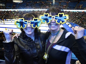 Brier fans Brenda Gilbertson, left, and Claudette Melin wear their custom made glasses to the 2013 Brier in this file photo from Rexall Place.
