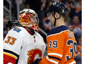 The Edmonton Oilers' Alex Chiasson (39) has words with the Calgary Flames goalie David Rittich (33) at Rogers Place on Wednesday, Jan. 29, 2020.