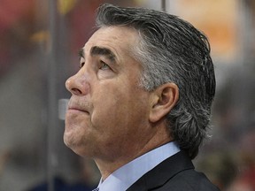 Edmonton Oilers head coach Dave Tippett watches his team play against the Carolina Hurricanes at PNC Arena on Feb. 16, 2020 in Raleigh, N.C.
