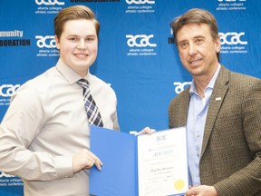 Evan Van Amsterdam, seen here with Concordia University accepting the all-conference award for mixed curling from Alberta Colleges Athletic Conference CEO Mark Kosak in this file photo from Feb. 25, 2017.