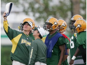 This is a file photo of Edmonton Eskimos head coach Tom Higgins during a practice at Clarke Stadium from August 6, 2004. On Wednesday, he was named defensive co-ordinator of the University of Alberta Golden Bears.