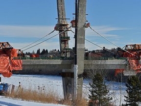 The first cable stays to support the new Tawatinâ Bridge have been installed that stabilize the construction allowing it to proceed across the North Saskatchewan River for the Southeast Valley Line LRT in Edmonton, January 30, 2020. Ed Kaiser/Postmedia