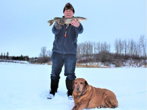 Neil Waugh and Penny with a Lake Isle pike.