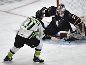 Edmonton Oil Kings Dylan Guenther (11) fires the puck at Red Deer Rebels goalie Ethan Anders (31) during WHL action at Rogers Place in Edmonton, February 7, 2020. Ed Kaiser/Postmedia