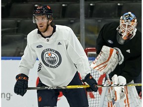 Edmonton Oilers captain Connor McDavid skates at practice in Edmonton on Thursday, Feb. 20, 2020. McDavid has been out of action with a leg injury.