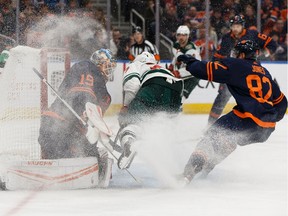 Edmonton Oilers' goaltender Mikko Koskinen (19) stops Minnesota Wild's Alex Galchenyuk (27) during second period NHL action at Rogers Place in Edmonton, on Friday, Feb. 21, 2020.