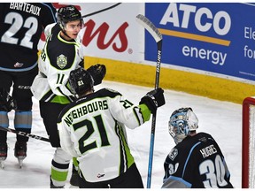 Edmonton Oil Kings forward Dylan Guenther (11) celebrates his goal with Jake Neighbours (21), setting a record for rookie points, on Winnipeg Ice goalie Liam Hughes (30) at Rogers Place on Tuesday, Feb. 25, 2020.