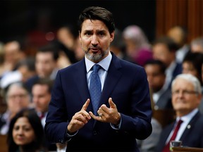 Canada's Prime Minister Justin Trudeau gestures as he speaks in parliament during Question Period in Ottawa, Ontario, Canada February 18, 2020. REUTERS/Patrick Doyle ORG XMIT: GGG-OTW124