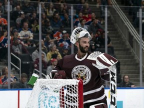 Marc-Olivier Daigle takes part in a game with the MacEwan University Griffins hockey team.