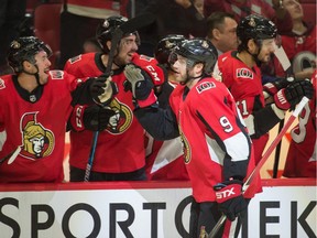 Bobby Ryan celebrates with the team after scoring his first of three goals against the Vancouver Canucks at the Canadian Tire Centre.