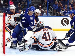 Edmonton Oilers goaltender Mike Smith (41) defends against Tampa Bay Lightning right wing Mathieu Joseph (7) at Amalie Arena on Thursday, Feb. 13, 2020.