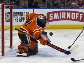 The Edmonton Oilers' goalie Mike Smith (41) makes a save against the Nashville Predators' Mikael Granlund (64) during second period NHL action at Rogers Place, in Edmonton Saturday Feb. 8, 2020.