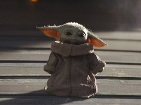 The Child, better known to audiences as "Baby Yoda", is seen in an undated still image from the Disney+ series "The Mandalorian" provided to Reuters February 5, 2020.