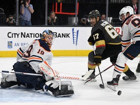 Mikko Koskinen (19) of the Edmonton Oilers makes a save as Max Pacioretty (67) of the Vegas Golden Knights looks for a rebound at T-Mobile Arena on Feb. 26, 2020, in Las Vegas. The Golden Knights defeated the Oilers 3-0.