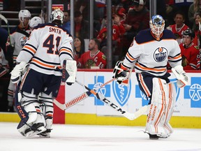 Mikko Koskinen (19) of the Edmonton Oilers replaces Mike Smith (41) in the second period against the Chicago Blackhawks at United Center on March 05, 2020, in Chicago.