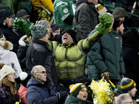 A football fan dressed as The Incredible Hulk watches the Edmonton Eskimos play against the Saskatchewan Roughriders Commonwealth Stadium on Oct. 26, 2019. Saskatchewan won 27-24.