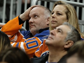 The Edmonton Oilers' fans react to the Calgary Flames' first goal at Rogers Place on Dec. 27, 2019.