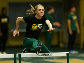 University of Alberta Golden Bears and Pandas Track and Field's Cassandra Grenke runs hurdles during a practice at the Butterdome on Jan. 15, 2020.