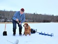 Neil and Penny ice fishing for pike on Battle Lake. Neil Waugh/Edmonton Sun