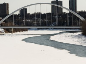The North Saskatchewan River is seen melting near the Walterdale Brige in Edmonton, on Monday, March 16, 2020.