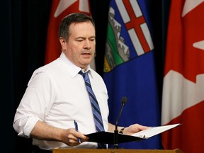 Premier Jason Kenney arrives to a press conference about the COVID-19 pandemic with Dr. Deena Hinshaw, Chief Medical Officer of Health, and Tyler Shandro, Minister of Health, at the Alberta Legislature in Edmonton, on Wednesday, March 25, 2020. Photo by Ian Kucerak/Postmedia