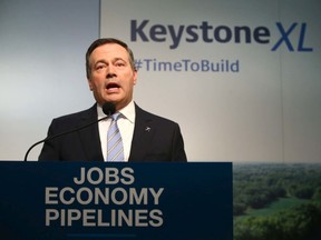 Alberta Premier Jason Kenney speaks in Calgary on Tuesday, March 31, 2020 about the the plan to kick-start construction on the Keystone XL pipeline. Jim Wells/Postmedia