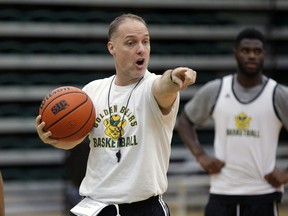 University of Alberta Golden Bears basketball team head coach Barnaby Craddock (middle) conducts team practice at Saville Community Sports Centre in this file photo from January 2017.