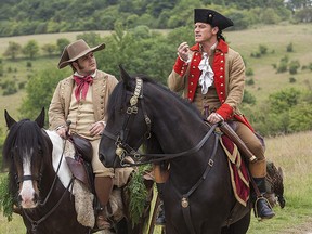 Josh Gad (L) and Luke Evans in a scene from the 2017 live-action "Beauty and the Beast" movie.