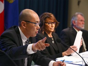 (L-R) Jason Luan, Associate Minister of Mental Health and Addictions, Geri Bemister-Williams, vice-chair, Supervised Consumption Services Review Committee and Rod Knecht, chair, Supervised Consumption Services Review Committee answer a question as the Government of Alberta released a report on safe consumption sites in Alberta during a press conference in Calgary on Thursday, March 5, 2020. Jim Wells/Postmedia