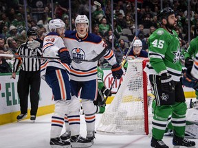 Edmonton Oilers centre Leon Draisaitl (29) and right wing Alex Chiasson (39) celebrate a goal scored by Draisaitl against the Dallas Stars at the American Airlines Center on Dec. 16, 2019.