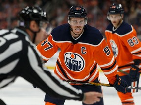 Edmonton Oilers' Connor McDavid lines up for a faceoff against the St. Louis Blues at Rogers Place, Nov. 6, 2019.  The NHL is reportedly looking at Edmonton as one of the markets to restart the hockey season.