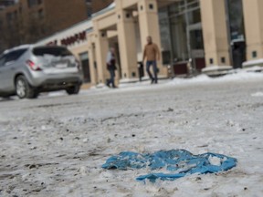 More and more instances of medical waste being disposed in parking lots of essential service stores like this glove in an Edmonton grocery store parking lot on March 31, 2020.