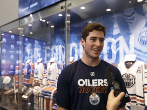 Defenceman Ryan Mantha is interviewed during the 2017 Edmonton Oilers Rookie Camp medical and fitness testing day at Rogers Place in Edmonton on Sept. 7, 2017.