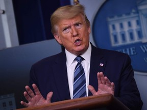 U.S. President Donald Trump speaks to reporters at the White House. (Eric Baradat/ Getty Images)