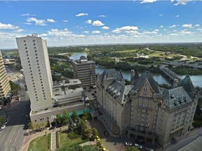 Great birds-eye view of the Fairmont Hotel Macdonald and the river valley looking east from the 20th floor of the ATB Building in downtown Edmonton, July 5, 2018. Ed Kaiser/Postmedia
