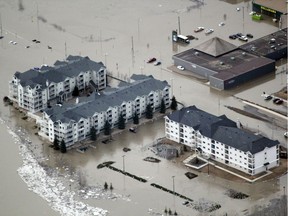 Flooded sections of downtown Fort McMurray as seen from the air on Monday, April 27, 2020. Supplied Image/McMurray Aviation