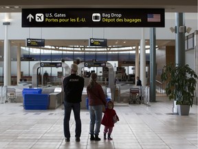 File: The area in front of the United States bag drop at the Edmonton International Airport on Tuesday, March 17, 2020, in Edmonton. Edmonton International Airport will stop taking international flights starting Wednesday, the federal government has announced.