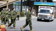 Members of the Canadian Armed Forces in front of Pickering's Orchard Villa long-term care home on May 6, 2020.