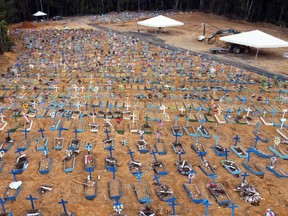 Aerial view of an area at the Nossa Senhora Aparecida cemetery where new graves have been dug in Manaus, Brazil, on Friday, May 22, 2020, amid the COVID-19 pandemic.