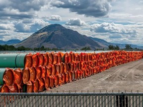 Steel pipe to be used in the oil pipeline construction of the Trans Mountain expansion project lies at a stockpile site in Kamloops, British Columbia.