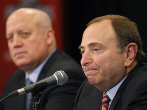 NHL commissioner Gary Bettman, right, and deputy commissioner Bill Daly appear in this file photo from the NHL Awards show on June 24, 2015, in Las Vegas.